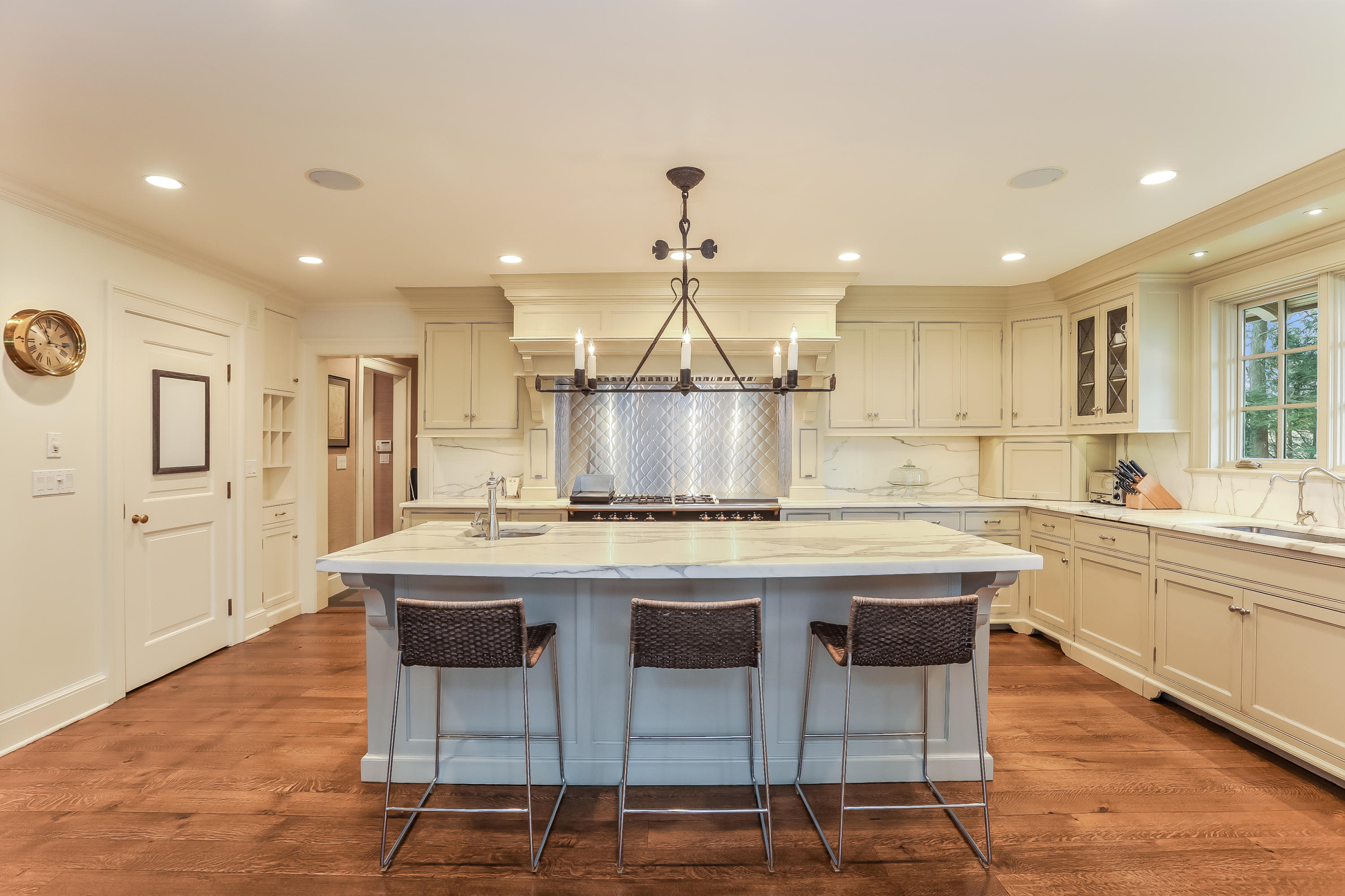 30 Old Farm Road Darien, CT 06820 - Photo 13 of 42 a kitchen with stainless steel appliances granite countertop a kitchen island a stove and a sink