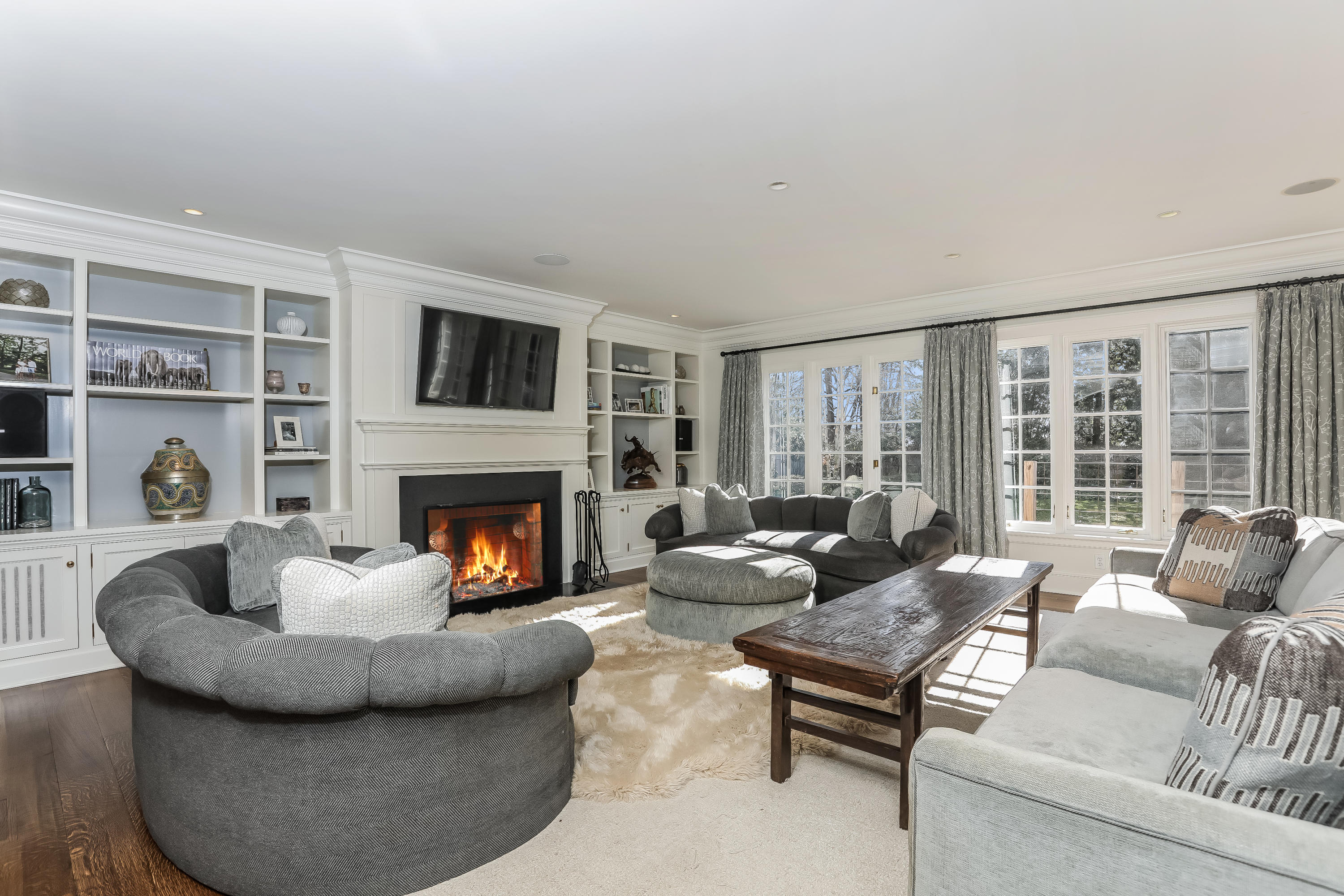 30 Old Farm Road Darien, CT 06820 - Photo 15 of 42 a living room with furniture and a fireplace