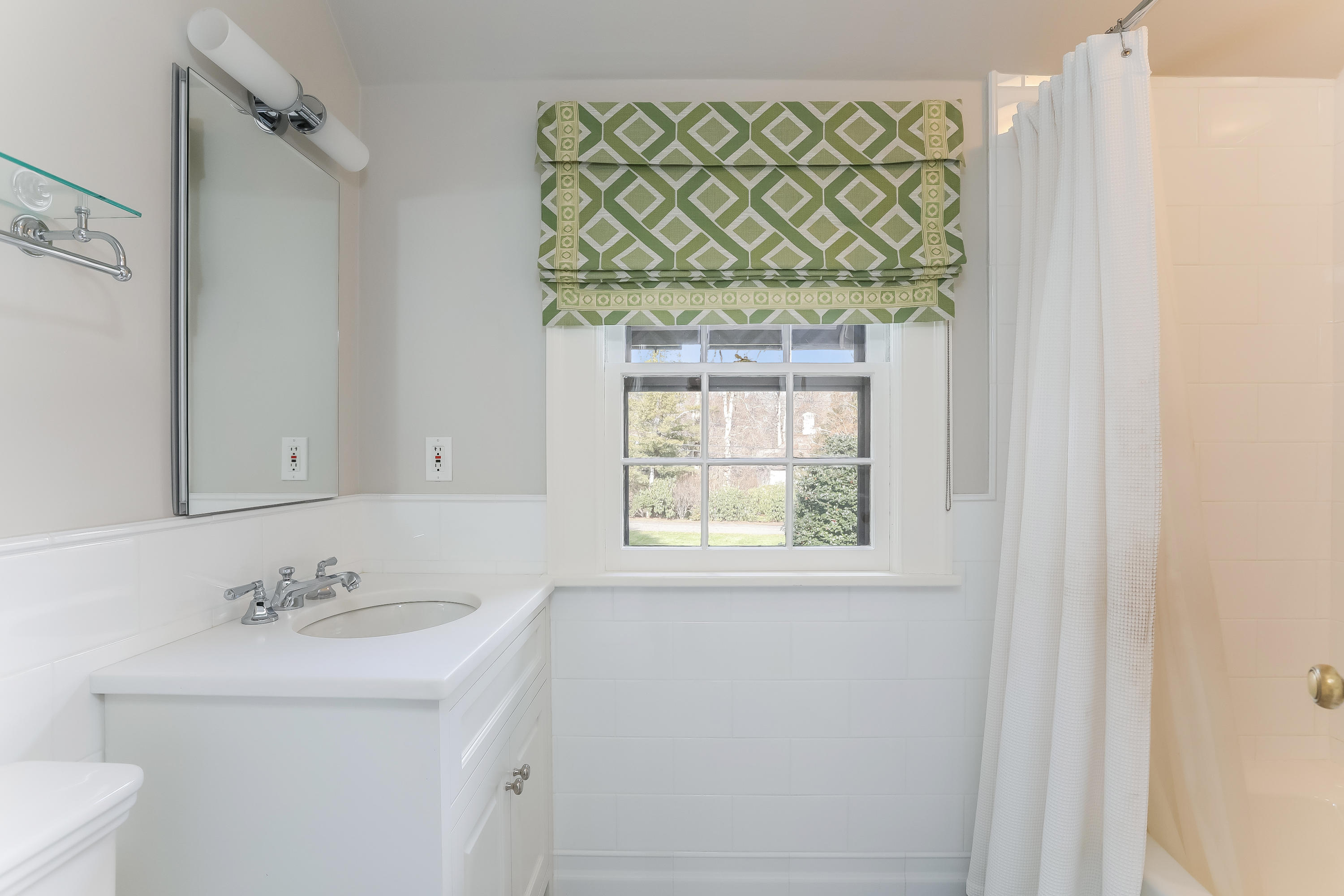 30 Old Farm Road Darien, CT 06820 - Photo 24 of 42 a bathroom with a sink and a mirror