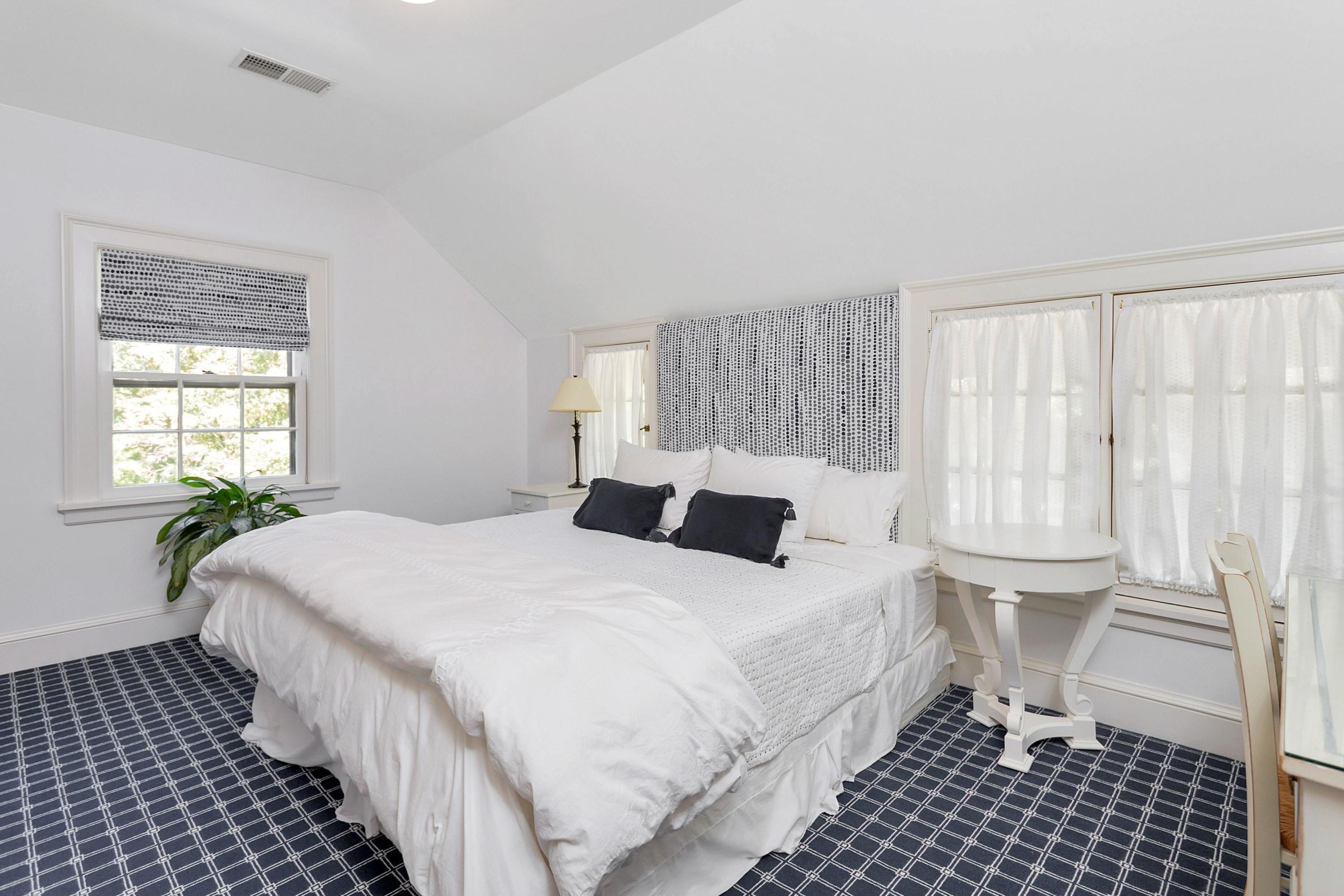 30 Old Farm Road Darien, CT 06820 - Photo 30 of 42 a bedroom with a bed and a window