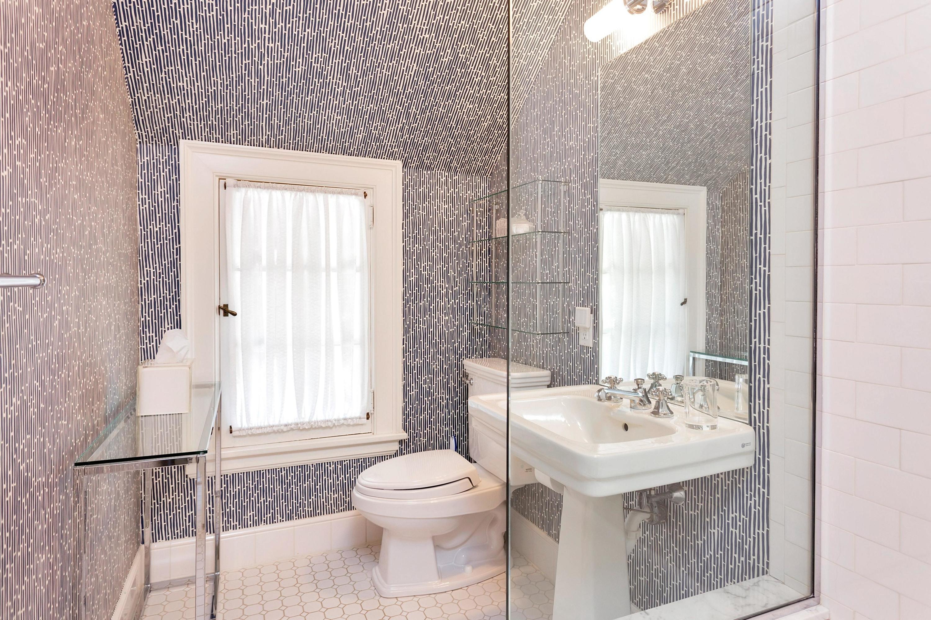 30 Old Farm Road Darien, CT 06820 - Photo 31 of 42 a bathroom with a sink toilet and window