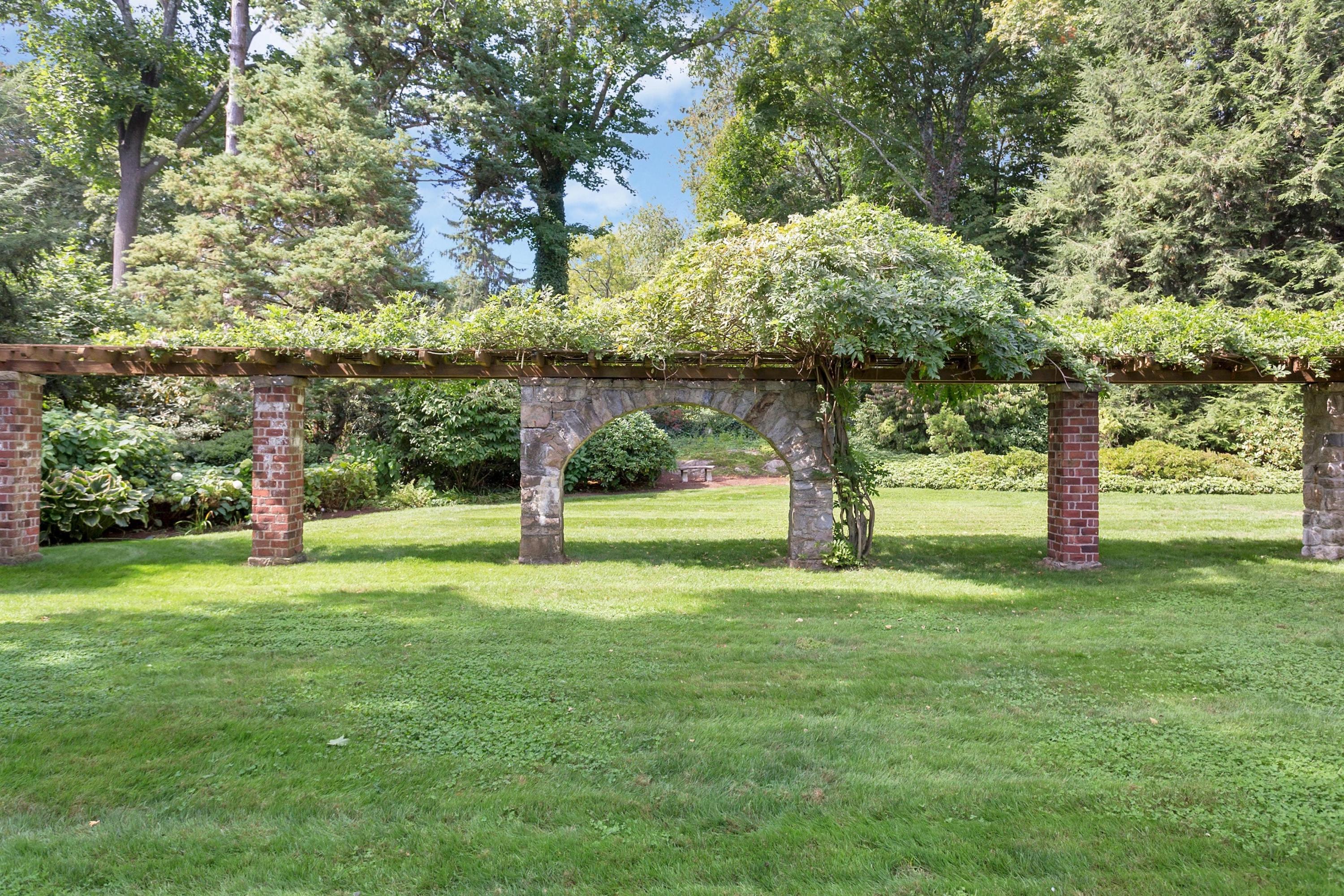30 Old Farm Road Darien, CT 06820 - Photo 38 of 42 a view of a garden with a tree