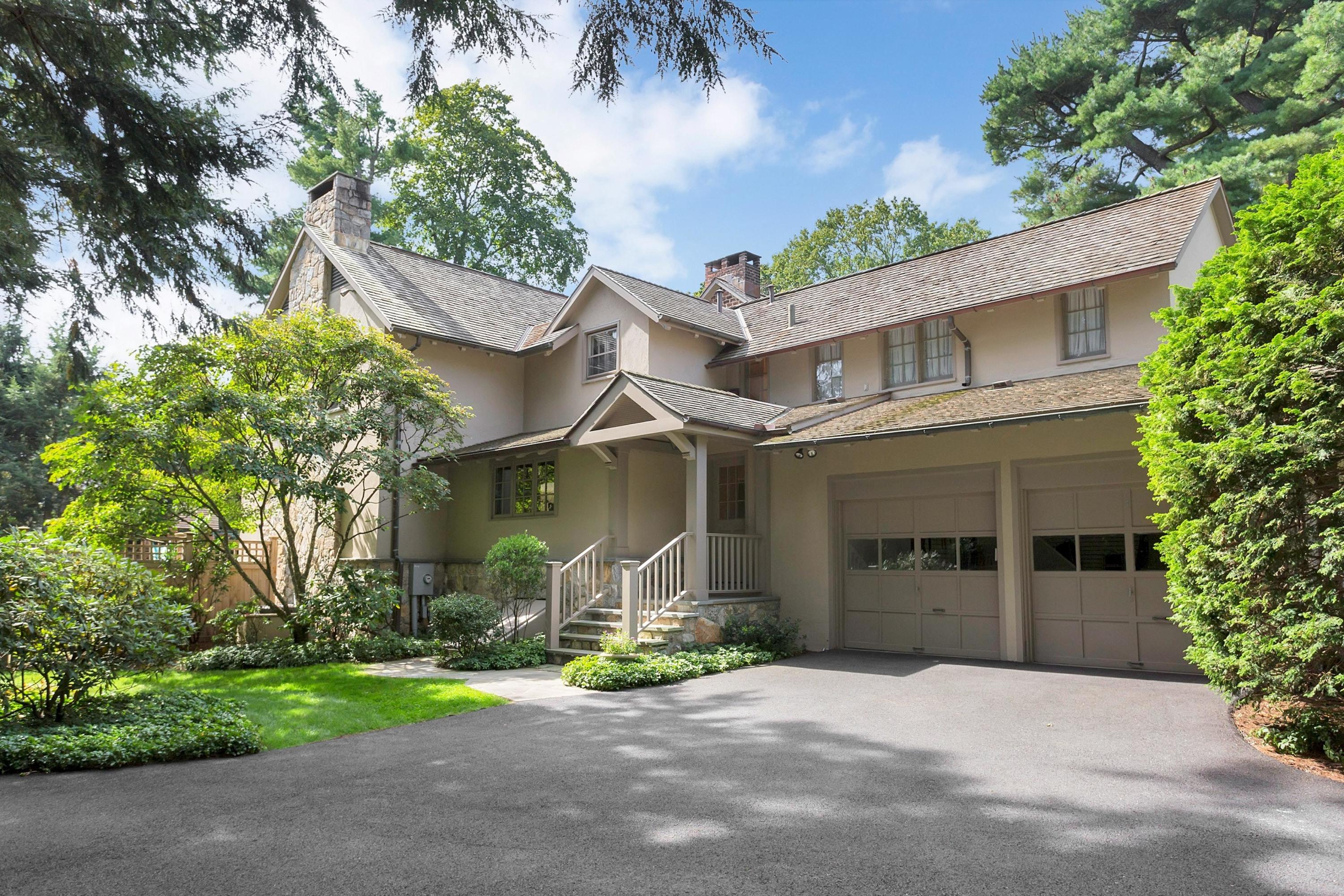 30 Old Farm Road Darien, CT 06820 - Photo 39 of 42 front view of house with a yard and potted plants