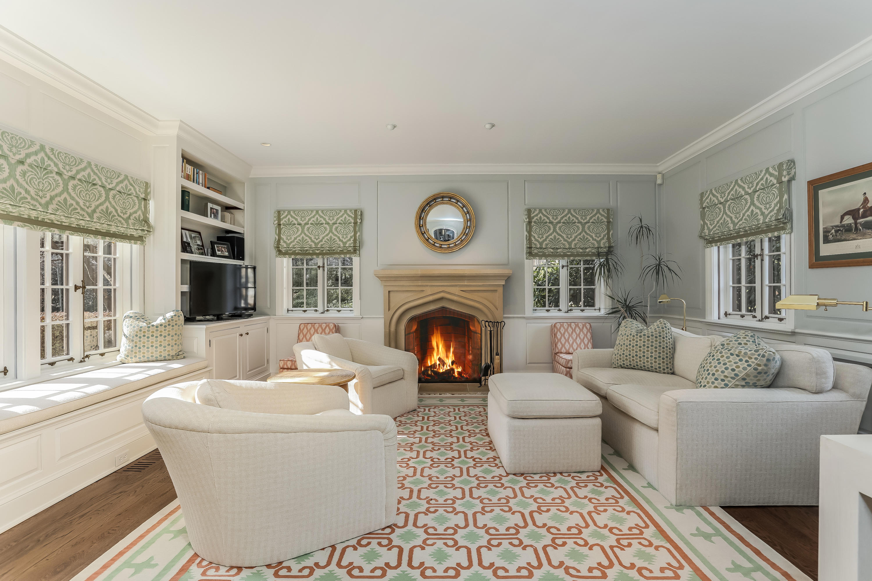 30 Old Farm Road Darien, CT 06820 - Photo 7 of 42 a living room with furniture a large window and a fireplace