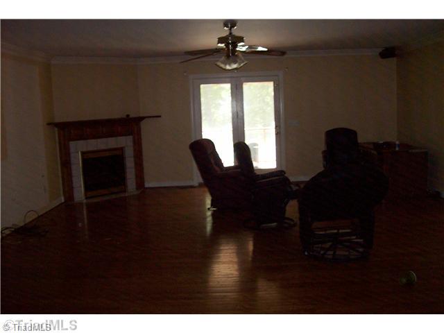 2027 Mack Road Asheboro, NC 27205 - Photo 11 of 16 Living Room. Hardwood Floors and Fireplace