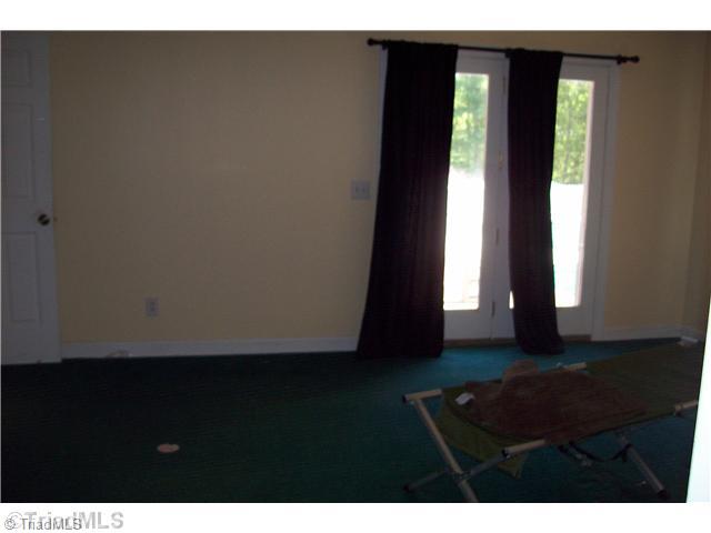 2027 Mack Road Asheboro, NC 27205 - Photo 15 of 16 Master Bedroom. Master Bedroom features doors to the patio