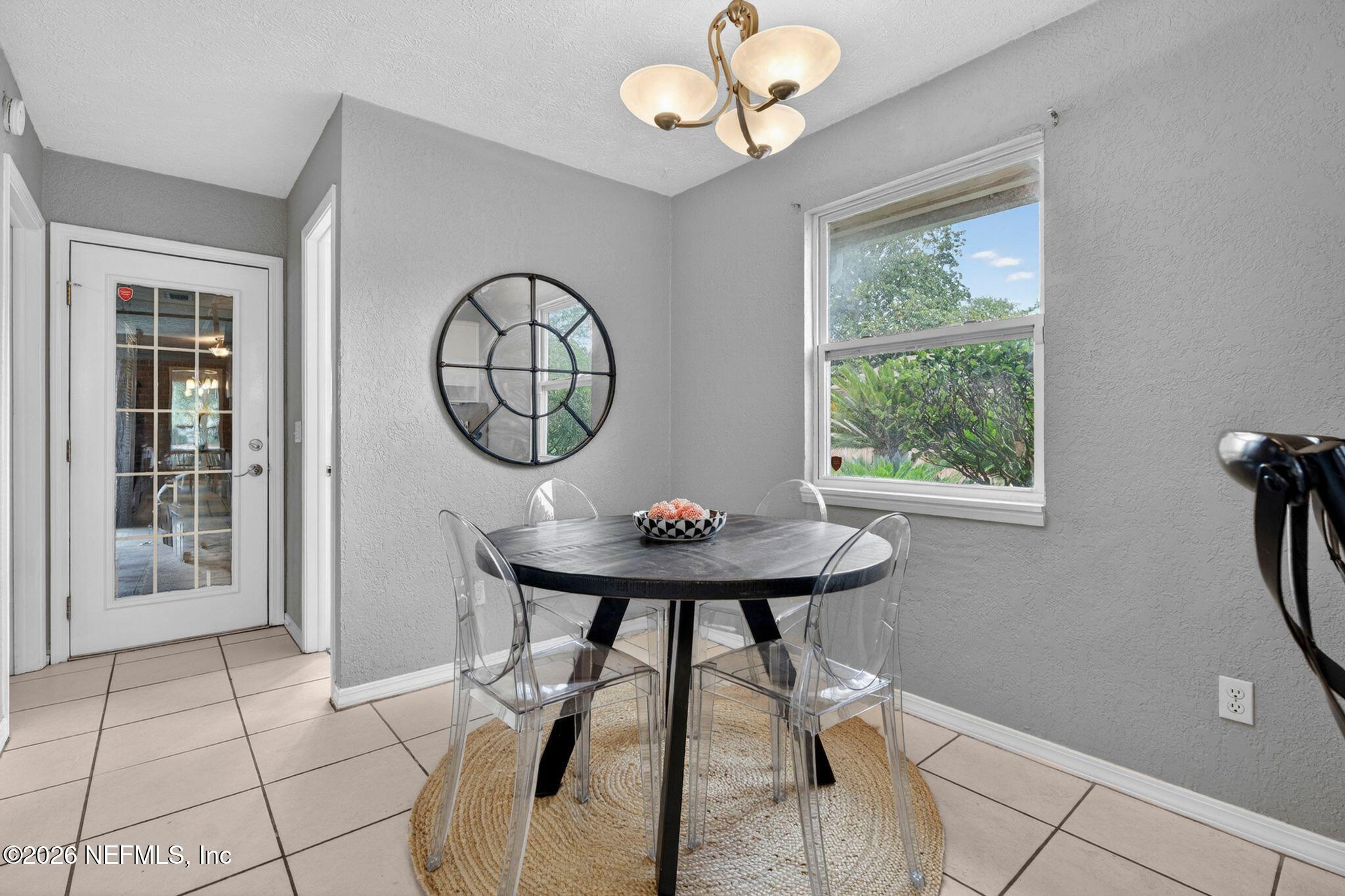 138 Ridgefield Court Orange Park, FL 32065 - Photo 22 of 64 a view of a livingroom with furniture and a window