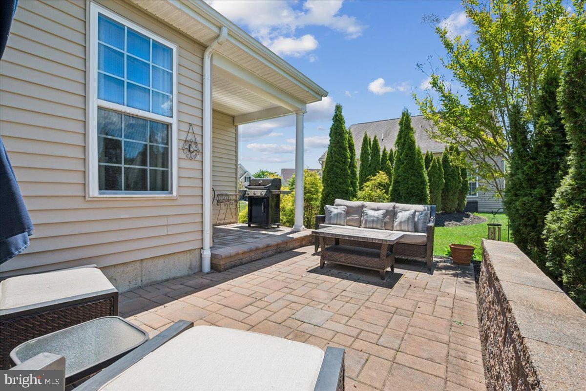 20 Montclaire Road Medford, NJ 08055 - Photo 5 of 34 Sunny patio with lush greenery.