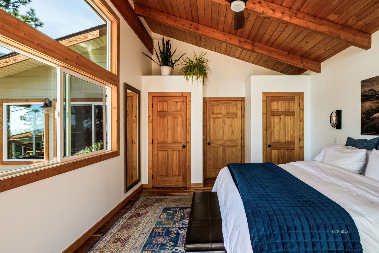 24750 Marion Ridge Drive Idyllwild, CA 92549 - Photo 36 of 45 a bedroom with a bed next to a window