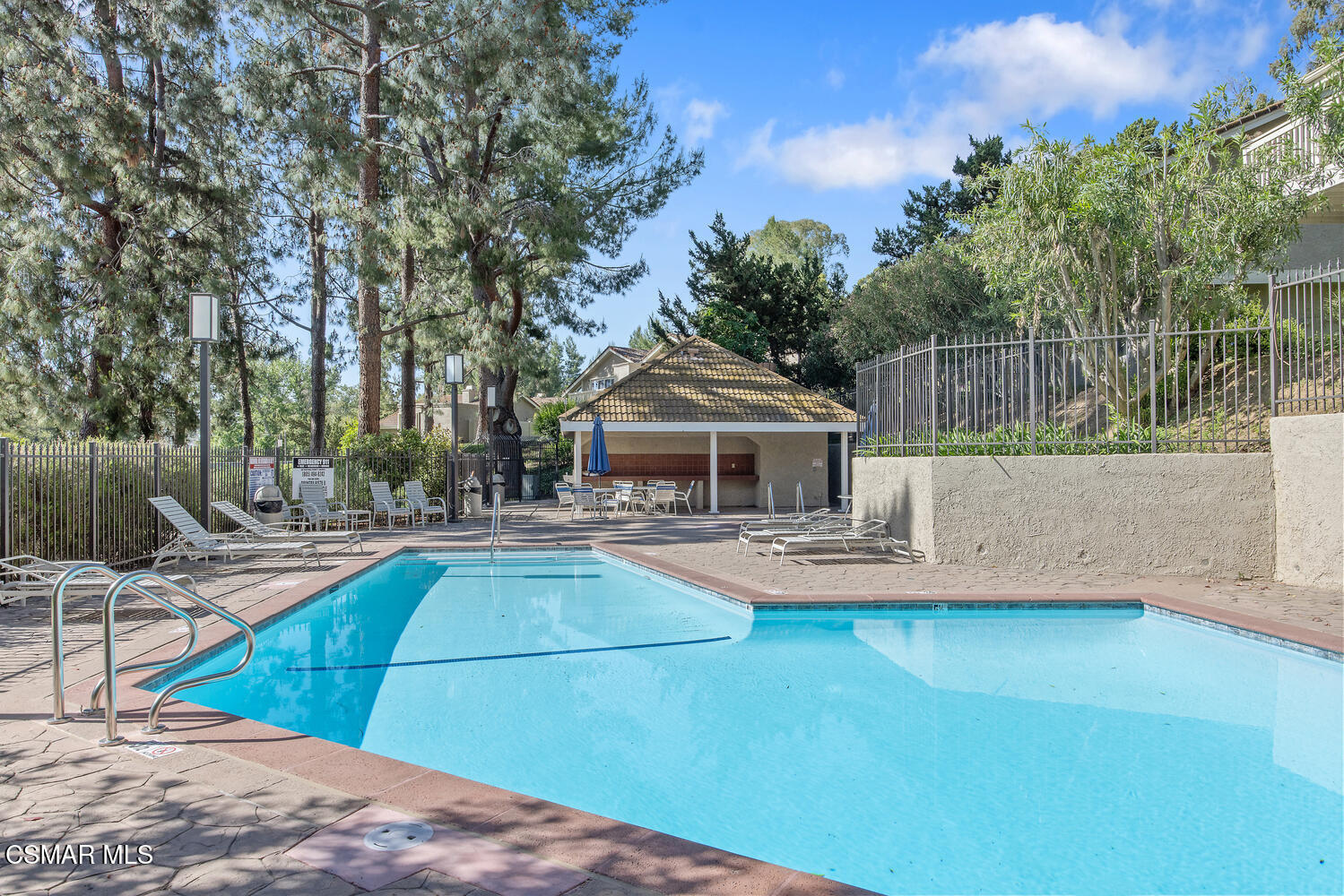 175 Conifer Circle Oak Park, CA 91377 - Photo 18 of 20 a view of a house with pool and sitting area