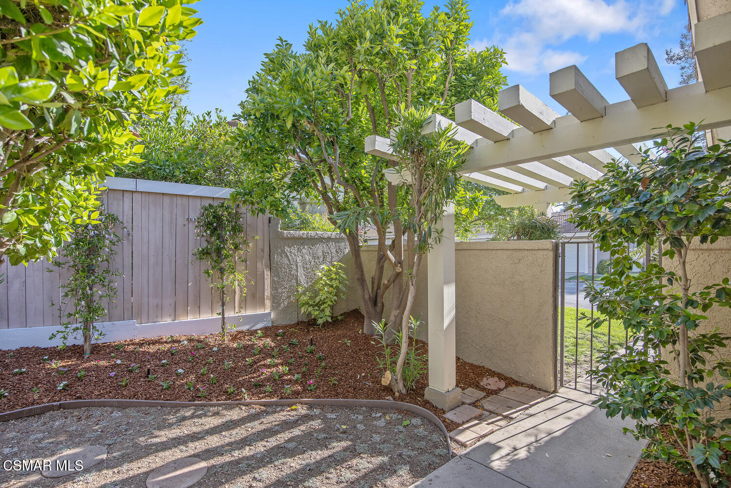 175 Conifer Circle Oak Park, CA 91377 - Photo 2 of 20 a view of a house with a tree