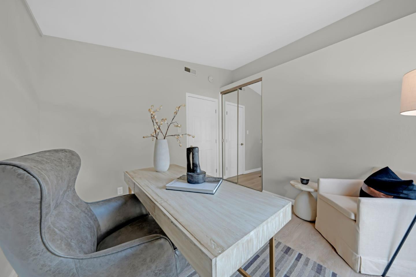 1775 Ravizza Avenue Santa Clara, CA 95051 - Photo 20 of 41 a living room with a couch and a table