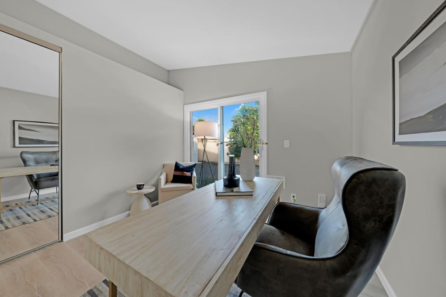 1775 Ravizza Avenue Santa Clara, CA 95051 - Photo 21 of 41 a room with furniture and a potted plant