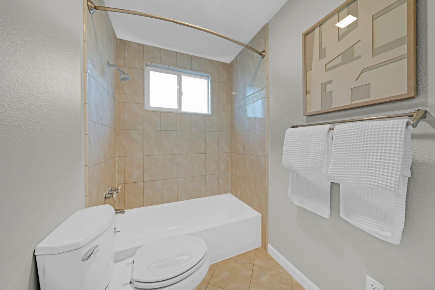 1775 Ravizza Avenue Santa Clara, CA 95051 - Photo 28 of 41 a bathroom with a toilet and a shower