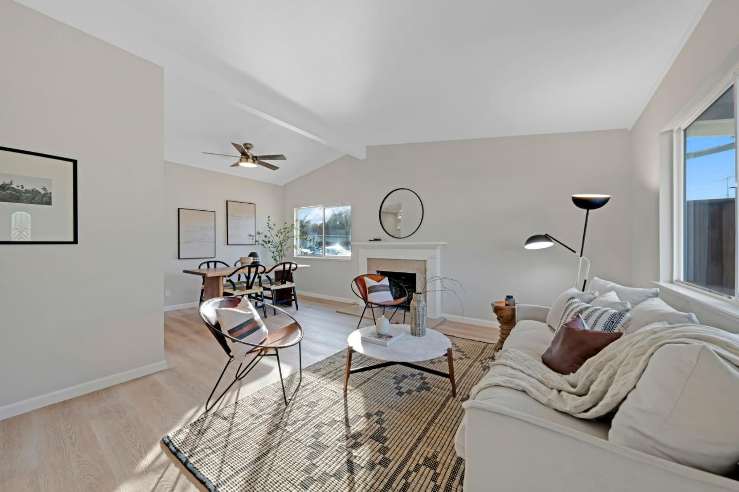 1775 Ravizza Avenue Santa Clara, CA 95051 - Photo 3 of 41 a living room with furniture a clock and a window