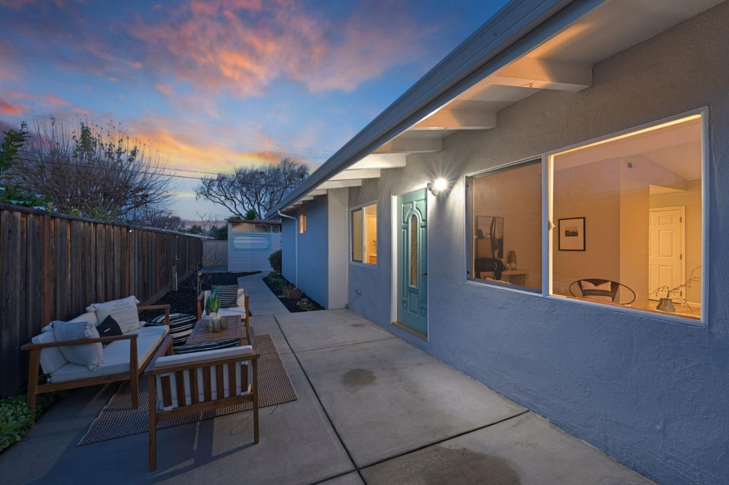 1775 Ravizza Avenue Santa Clara, CA 95051 - Photo 32 of 41 a backyard of a house with table and chairs