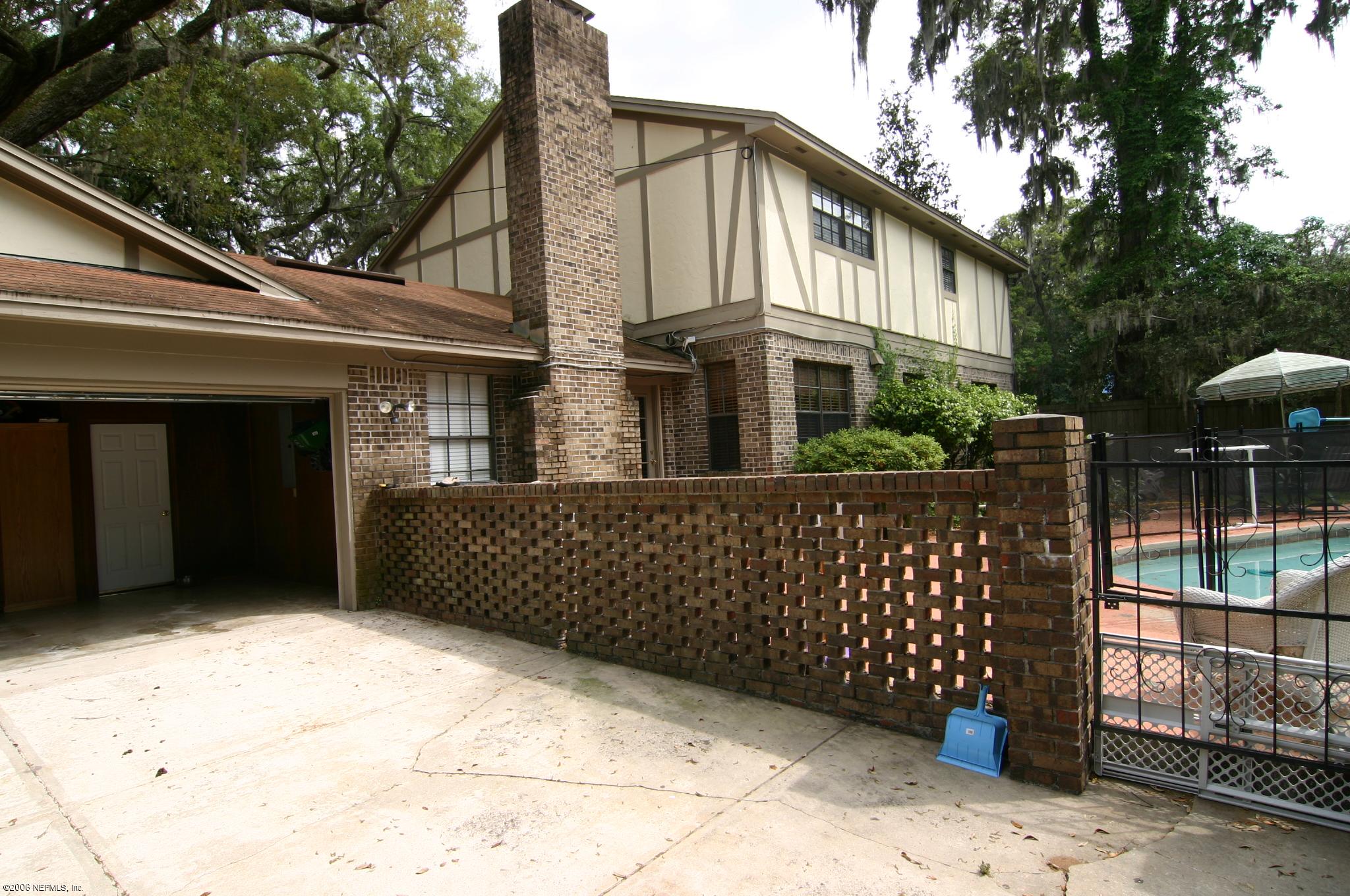 11743 Fort Caroline Road Jacksonville, FL 32225 - Photo 3 of 9 a front view of a house