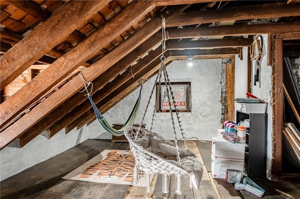 701 Oakbourne Road West Chester, PA 19382 - Photo 38 of 50 a view of staircase with wooden floor and chair