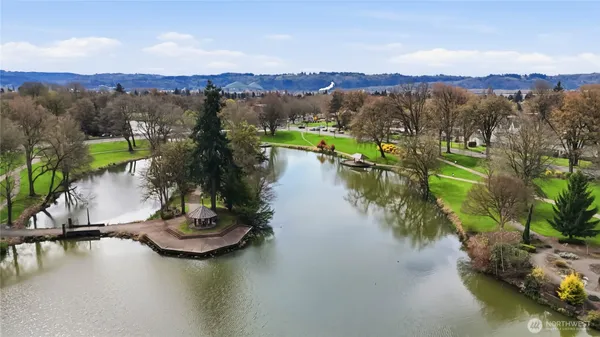 an aerial view of a house with a lake view