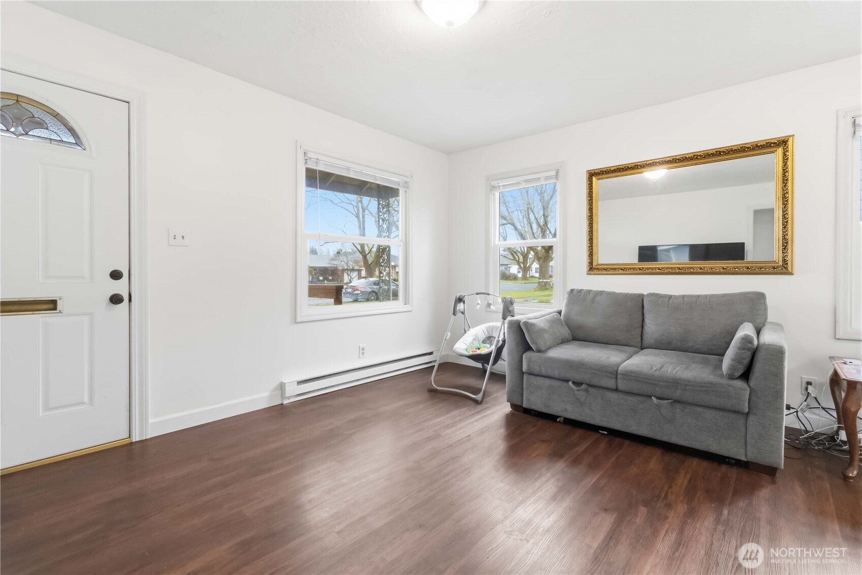 463 26th Avenue Longview, WA 98632 - Photo 4 of 28 a living room with furniture and a wooden floor