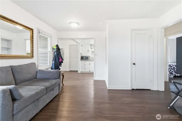a kitchen with stainless steel appliances a refrigerator sink and cabinets