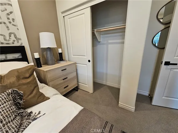 a view of a hallway with washer and dryer