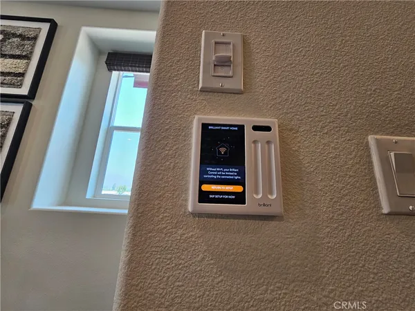 a bedroom with bed and wooden floor