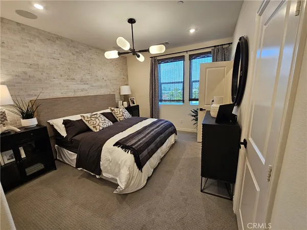 a white toilet sitting next to a sink