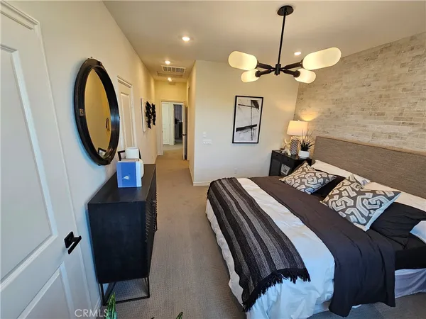 a living room with furniture fireplace and flat screen tv