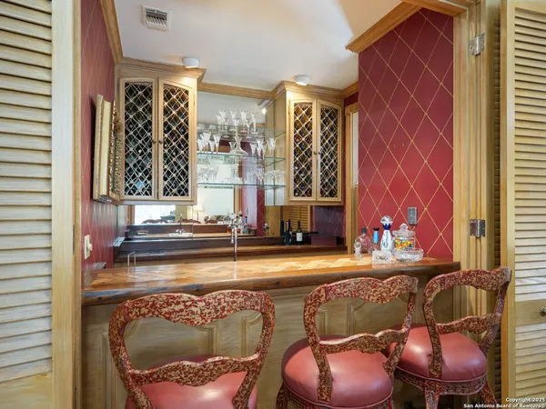 a living room with furniture rug and window