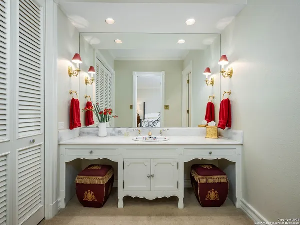 a view of a house with a snow on the road