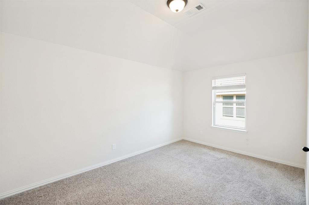 14215 Raspberry Lane Frisco, TX 75035 - Photo 20 of 30 Carpeted room featuring neutral wall paint, a window with blinds, baseboard trim, and a ceiling-mounted light fixture
