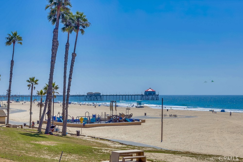 225 20th Street Huntington Beach, CA 92648 - Photo 43 of 47 a view of a water with palm trees