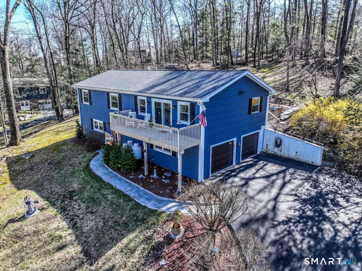 156 Stadley Rough Road Danbury, CT 06811 - Photo 1 of 32 The driveway is inclined, but beautifully repaved and provides turn around spaces or additional parking for guests in two different areas.