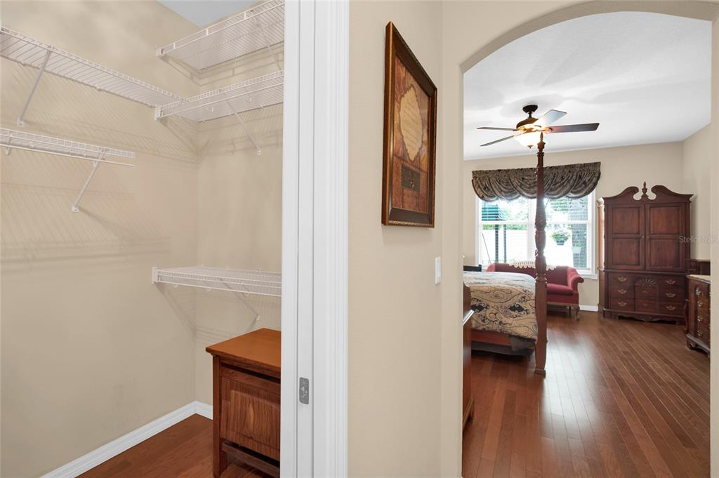 16411 Southwest 14th Avenue Road Ocala, FL 34473 - Photo 15 of 59 a bedroom with furniture and a window