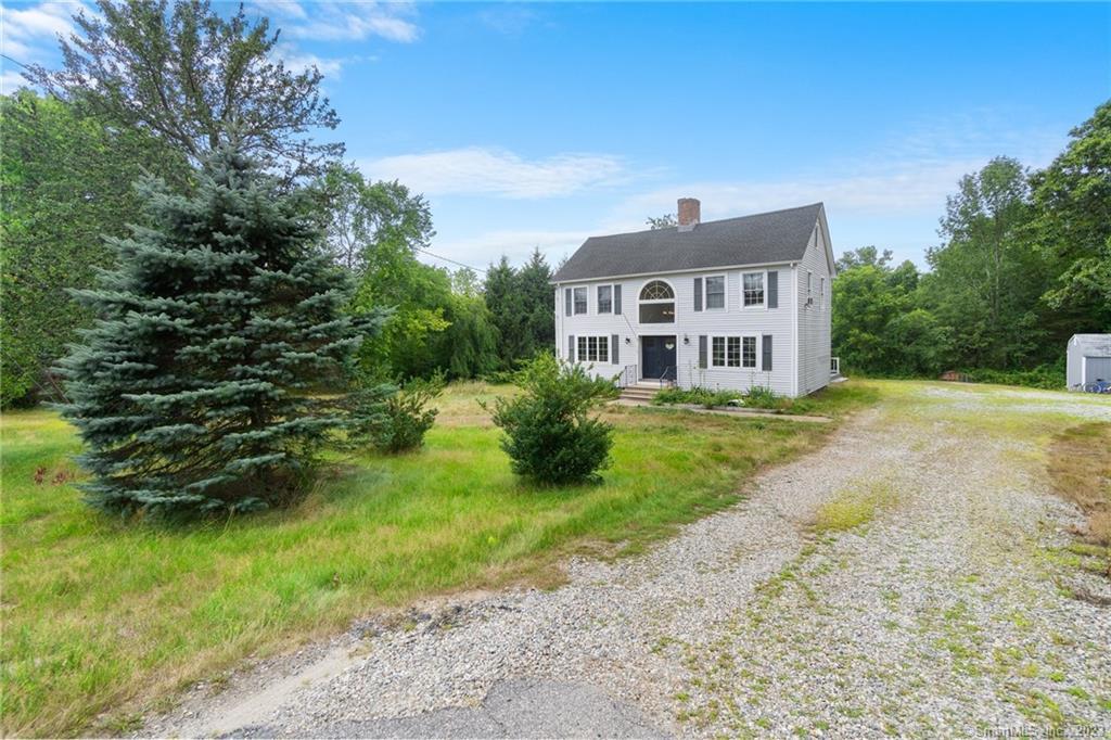 110 Squaw Rock Road Killingly, CT 06239 - Photo 1 of 1 a front view of a house with a yard