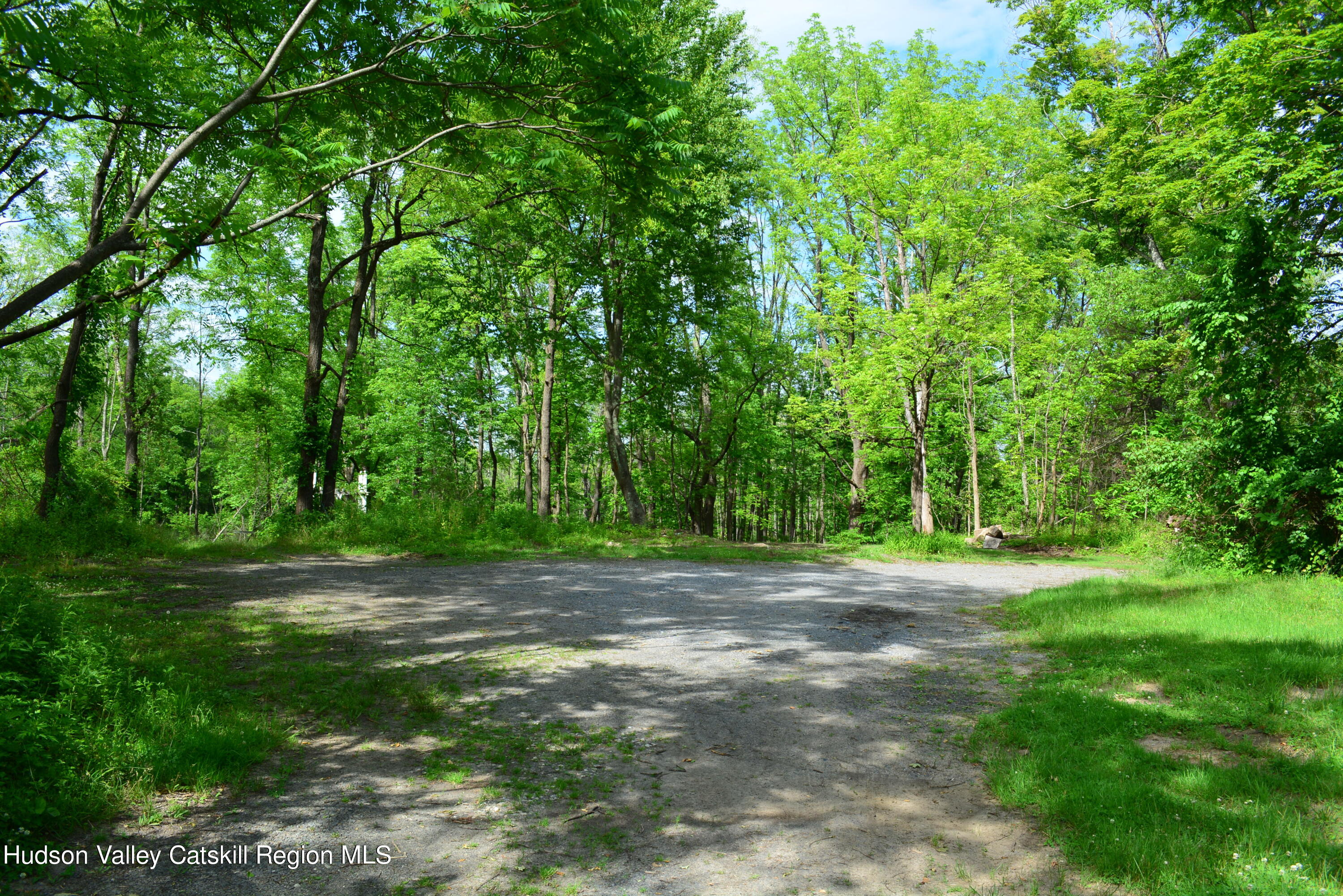 345 Towpath Road Accord, NY 12404 - Photo 11 of 35 a view of a fire pit in middle of a forest