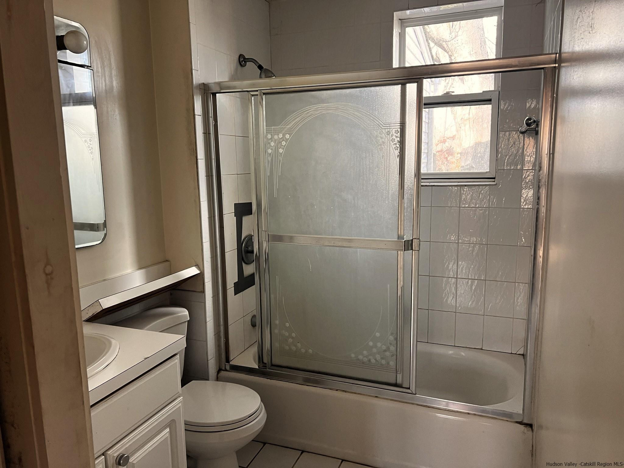 345 Towpath Road Accord, NY 12404 - Photo 31 of 35 a bathroom with a shower a toilet and a sink