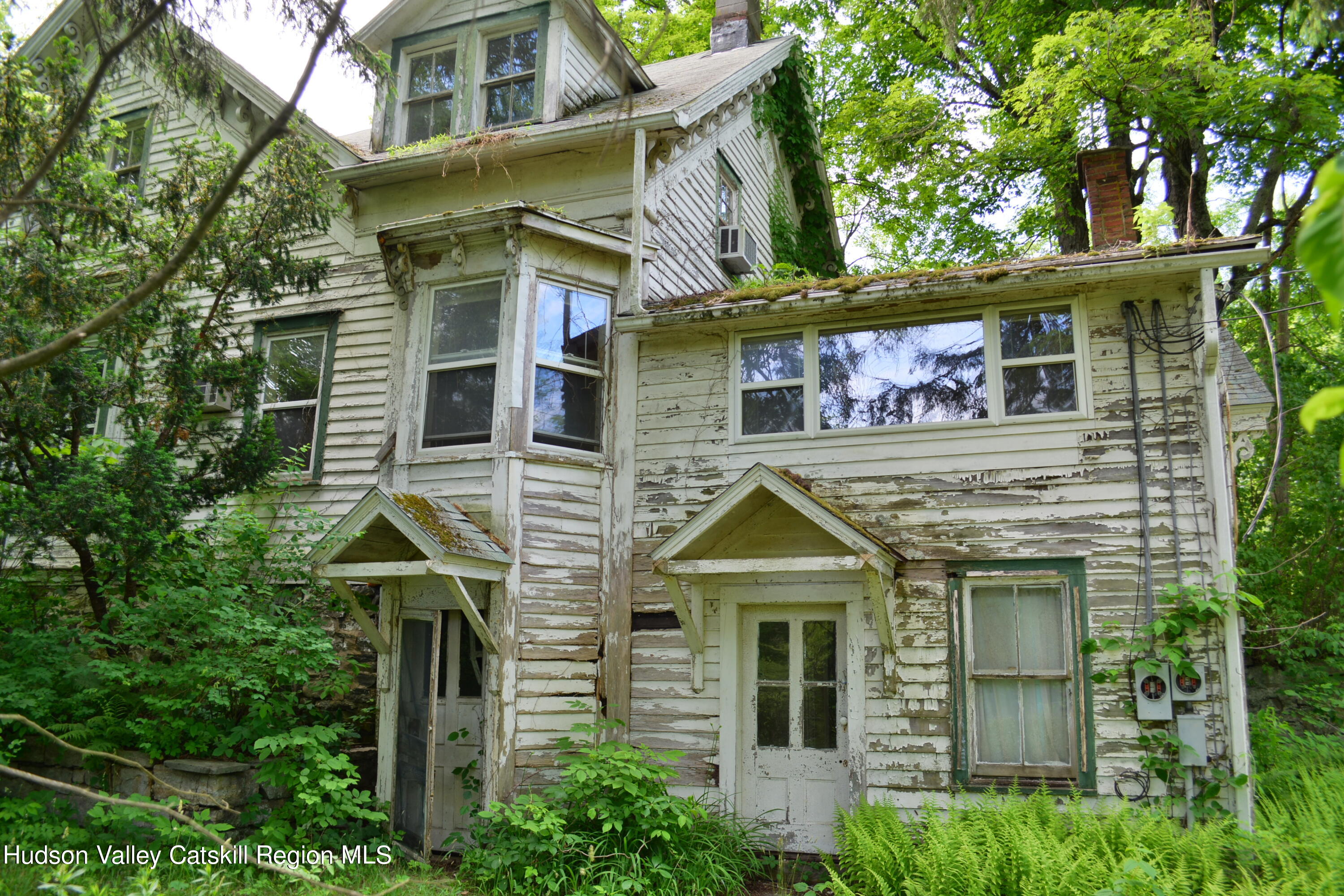 345 Towpath Road Accord, NY 12404 - Photo 7 of 35 a view of a house with a iron stairs
