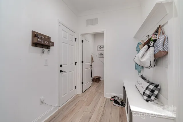 a view of a livingroom with wooden floor