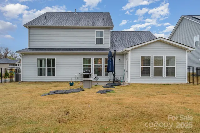 a front view of a house with a outdoor space