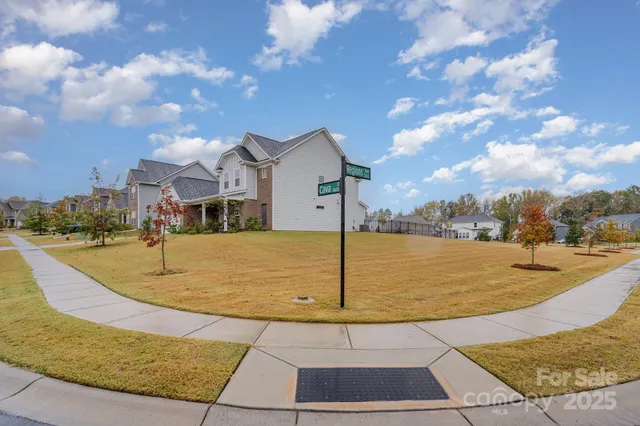 a view of a patio with swimming pool