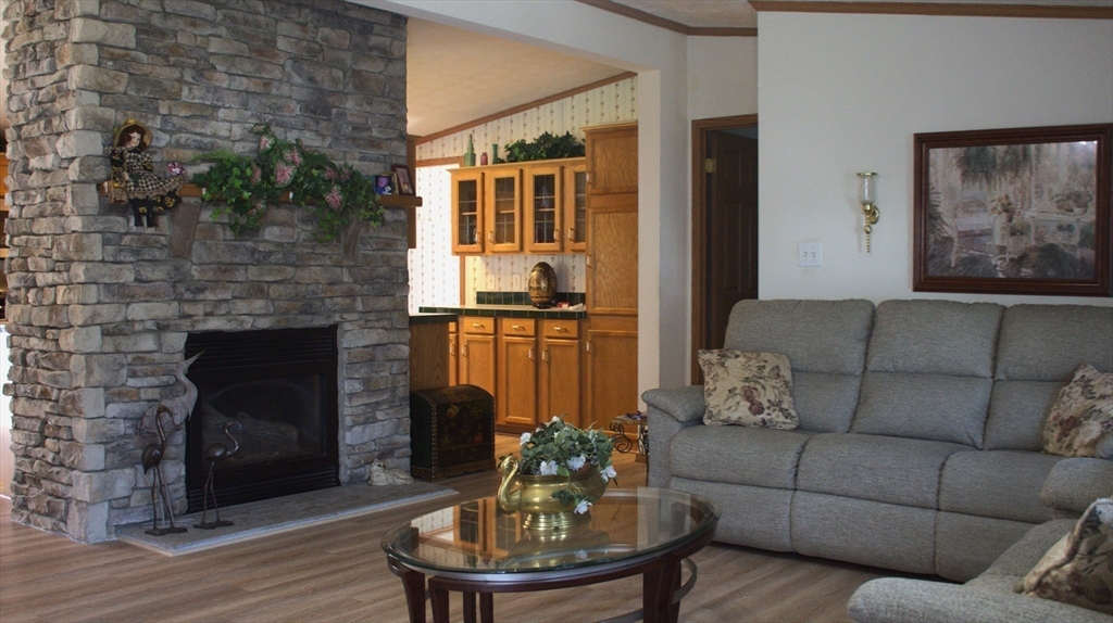 20 Deer Run Brookfield, MA 01506 - Photo 11 of 29 a living room with furniture and a fireplace