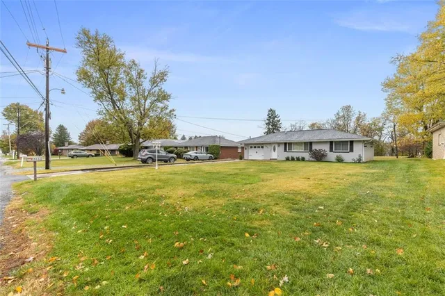 a view of swimming pool with outdoor space and seating area