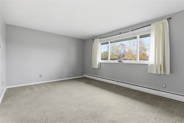 an empty room with window