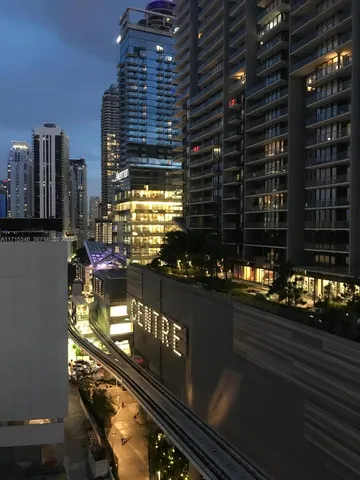 a bathroom with glass door