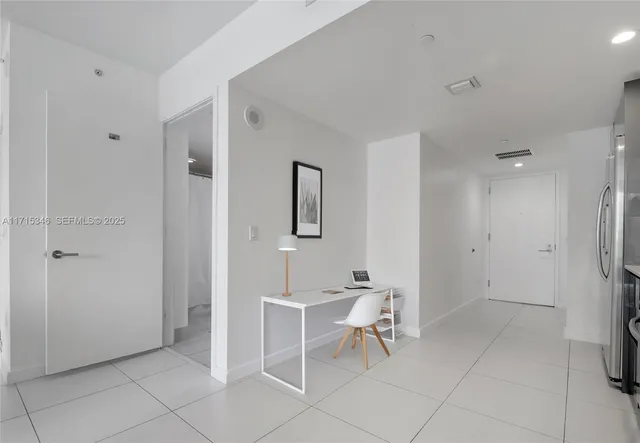 a view of a livingroom with furniture