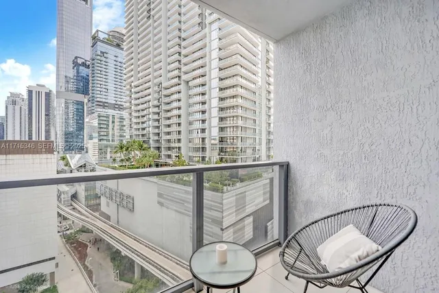 a bathroom with a toilet a sink and a mirror