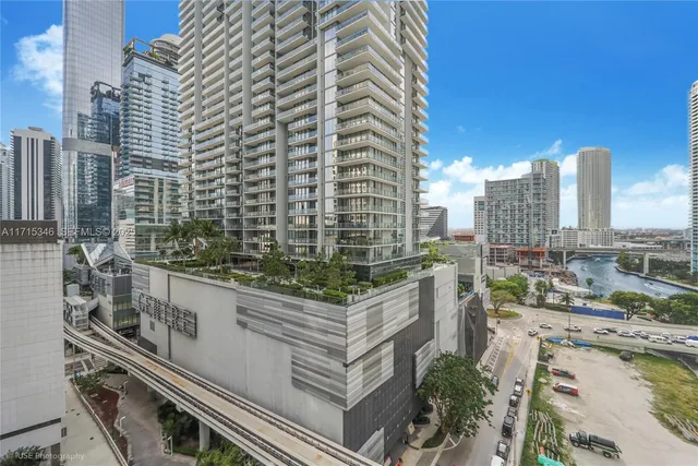 a view of a city with tall buildings