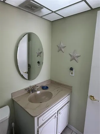 a bedroom with two beds and a window